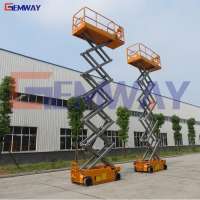 One man operating battery powered self-propelled scissor lift